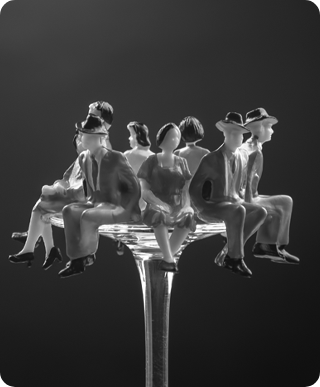 3D people sitting on bottom edge of glass